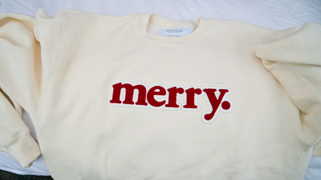 off-white sweatshirt with 'merry' written in red on the front is a random part of my minimalist wardrobe