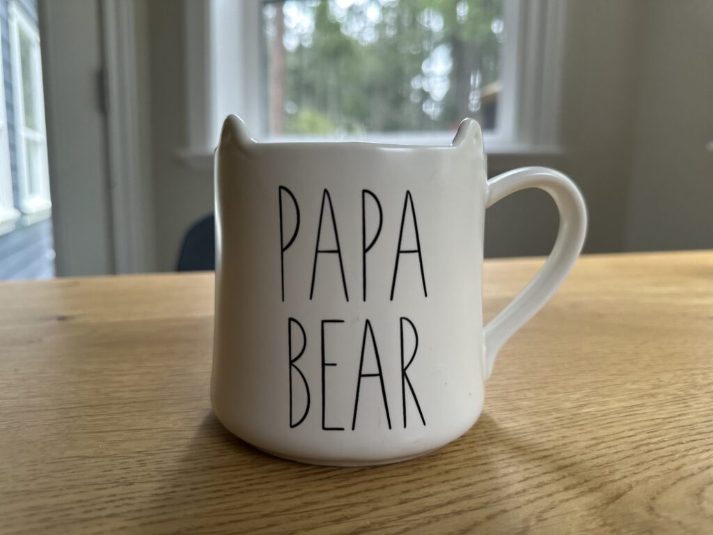 large papa bear mug with bear ears sitting on table