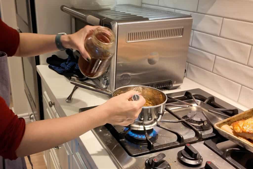 adding stock Garlic Thanksgiving Turkey Gravy
