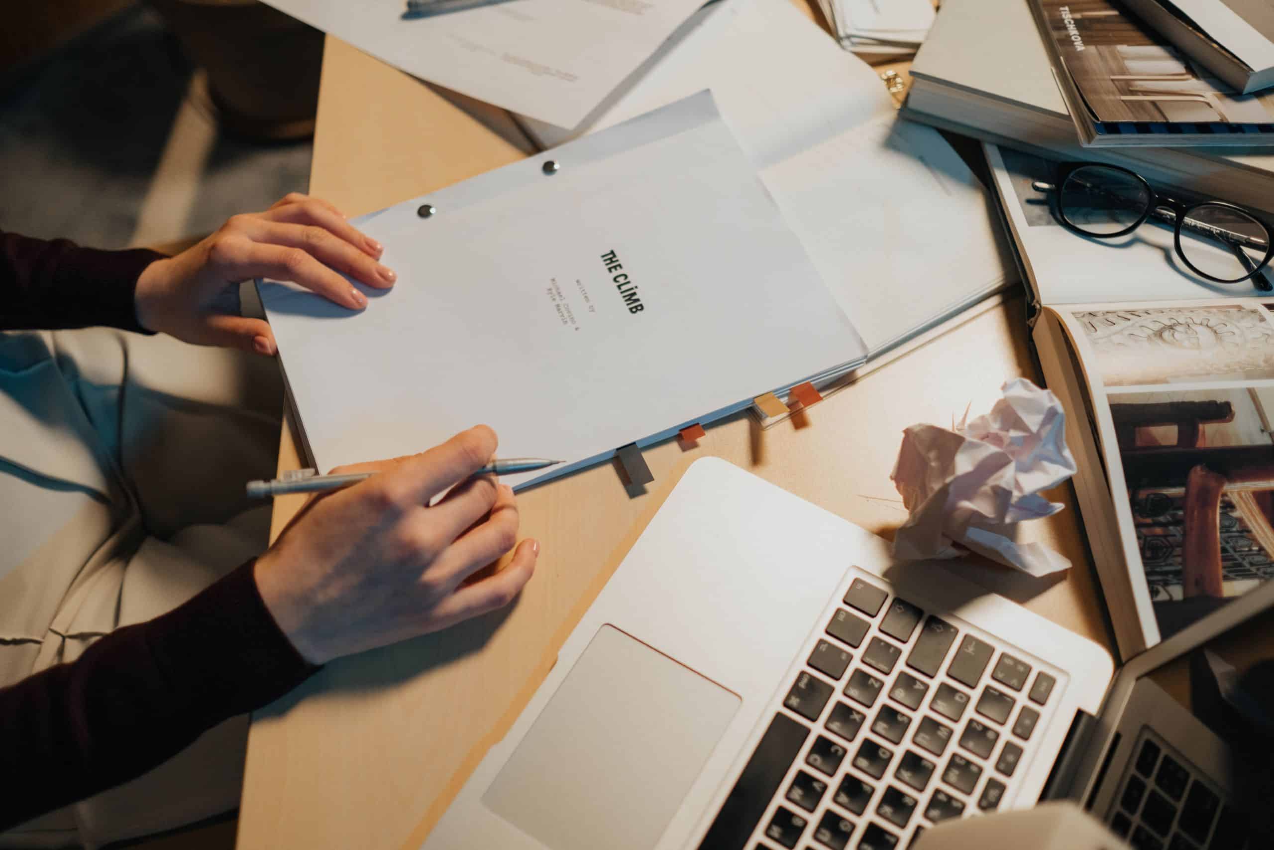 PEXELS Cozy desk with screenplay, perfect for writing and research.